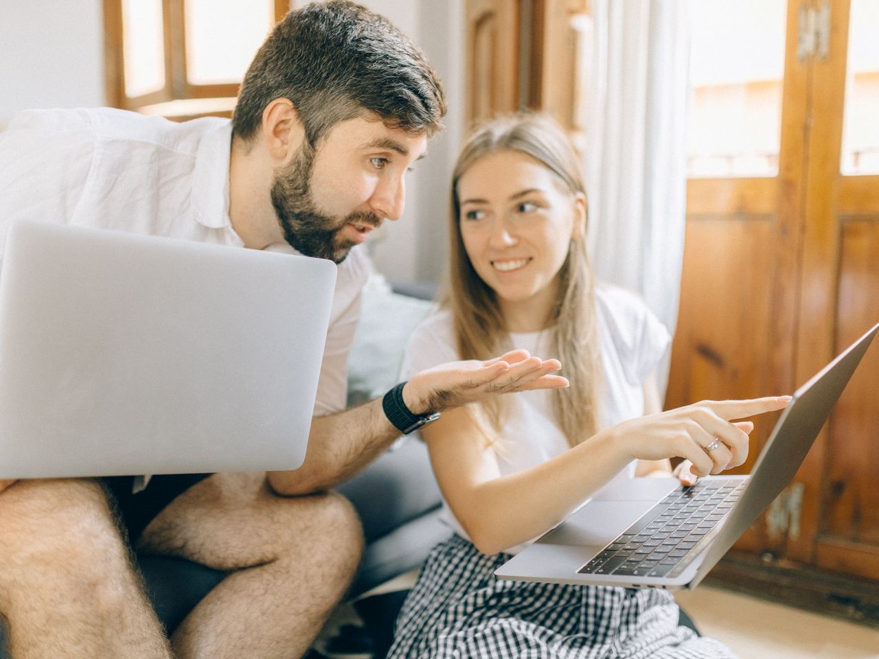 Couple reviewing life insurance information at home