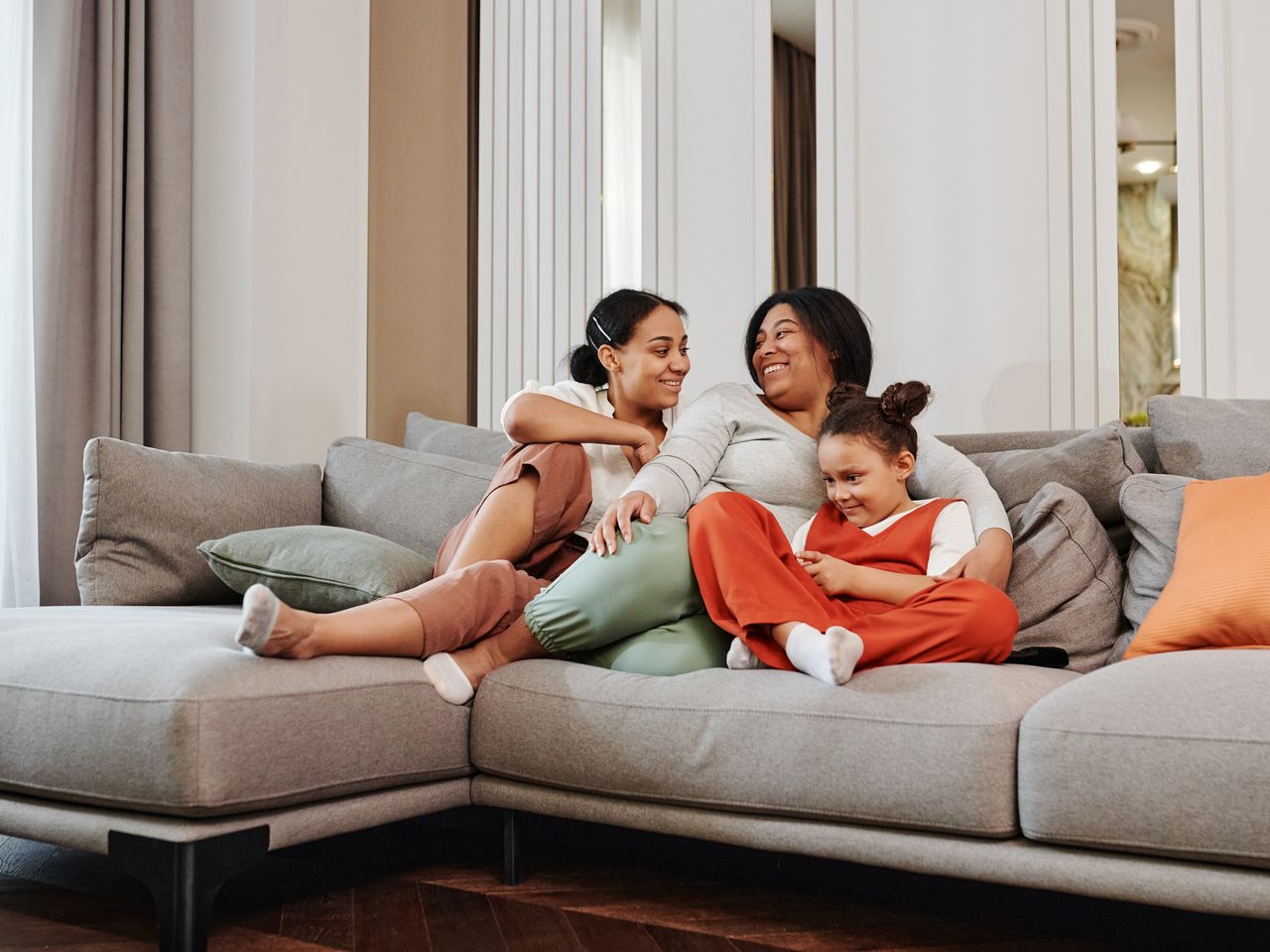 Young family relaxing together at home